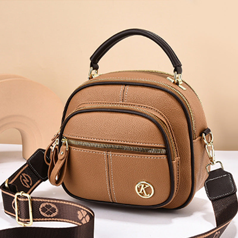 ⏰👜✨ Bolso bandolera clásico de piel sintética: versátil, correa ancha ajustable y múltiples compartimentos.