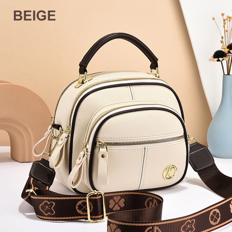 ⏰👜✨ Bolso bandolera clásico de piel sintética: versátil, correa ancha ajustable y múltiples compartimentos.