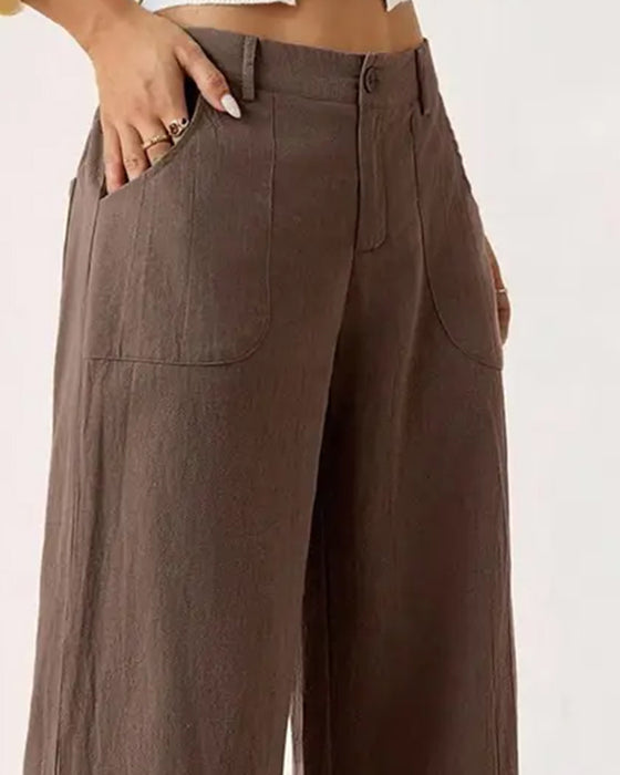 Pantalones con cintura elástica, bolsillo y pernera ancha de estilo casual.