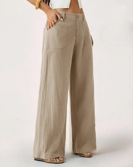Pantalones con cintura elástica, bolsillo y pernera ancha de estilo casual.