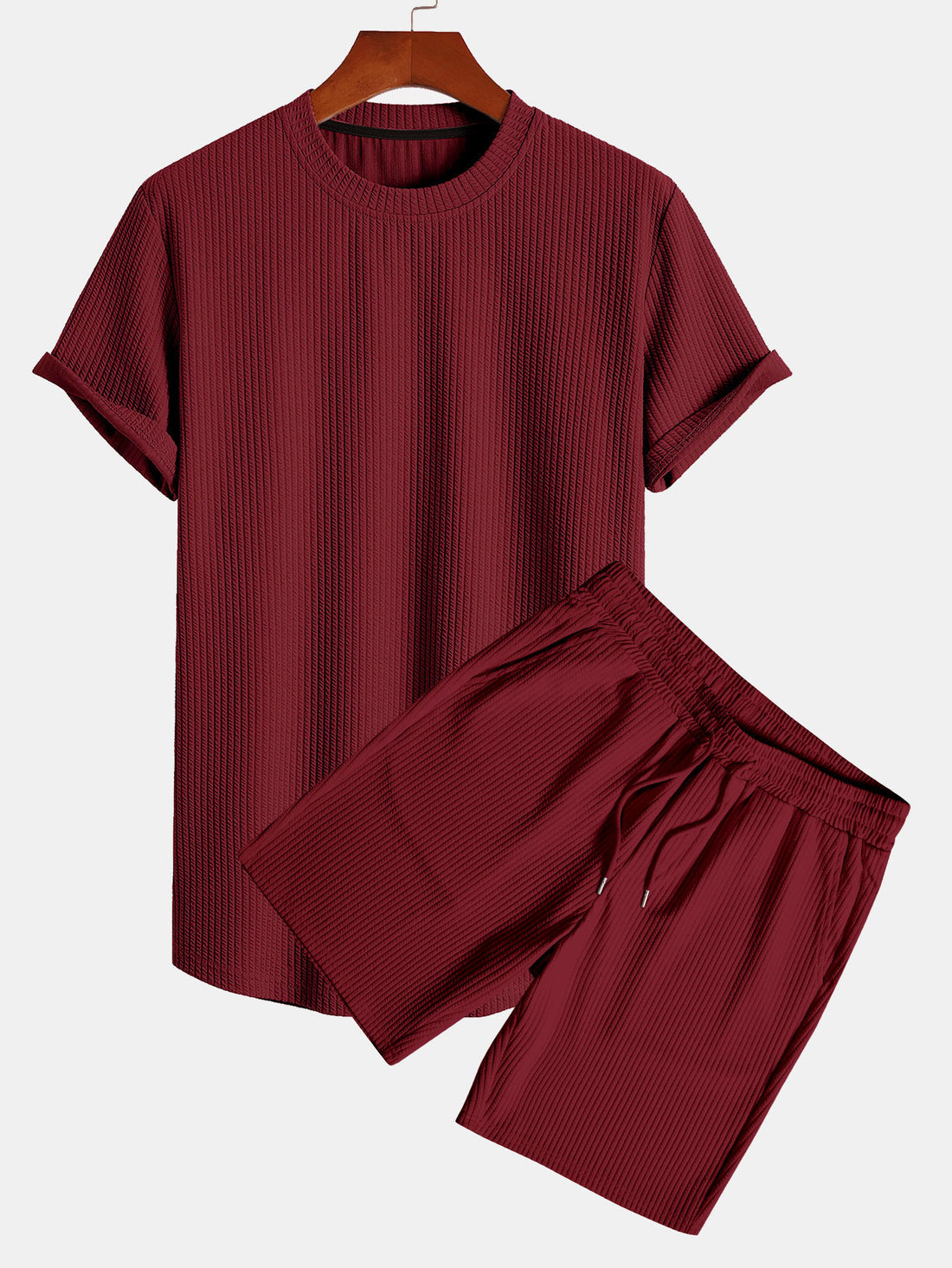 Camiseta ajustada musculosa con dobladillo curvo y pantalones cortos