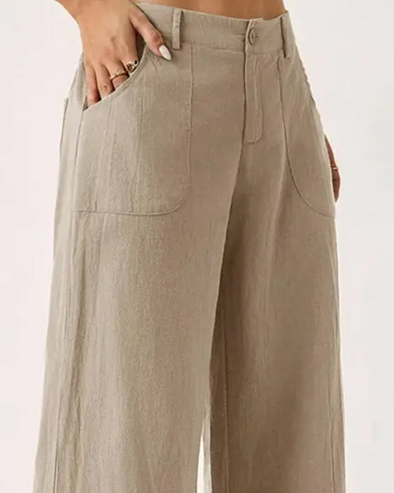 Pantalones con cintura elástica, bolsillo y pernera ancha de estilo casual.