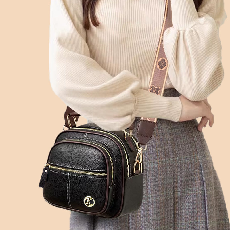 ⏰👜✨ Bolso bandolera clásico de piel sintética: versátil, correa ancha ajustable y múltiples compartimentos.