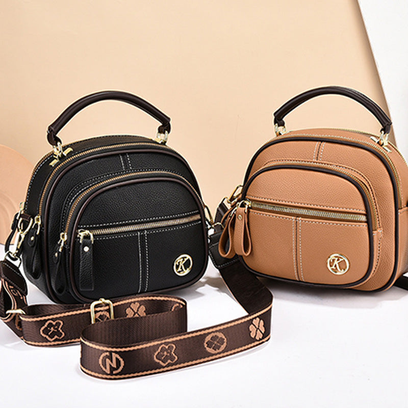 ⏰👜✨ Bolso bandolera clásico de piel sintética: versátil, correa ancha ajustable y múltiples compartimentos.