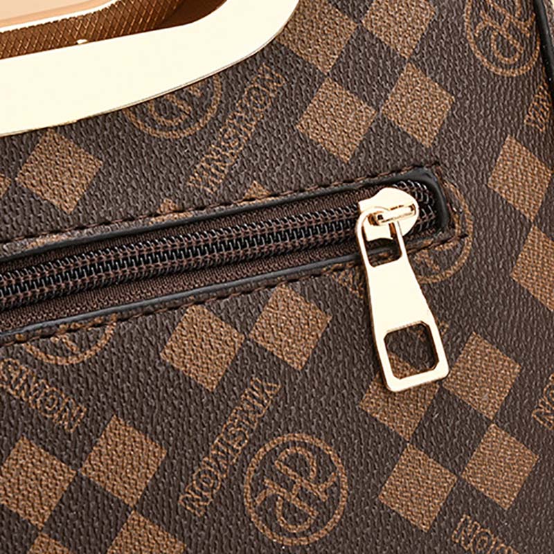 Elegante bolso de mano para mujer con dije de hoja