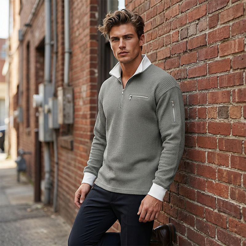 Suéter de punto gofrado para hombre con cremallera hasta el cuello.