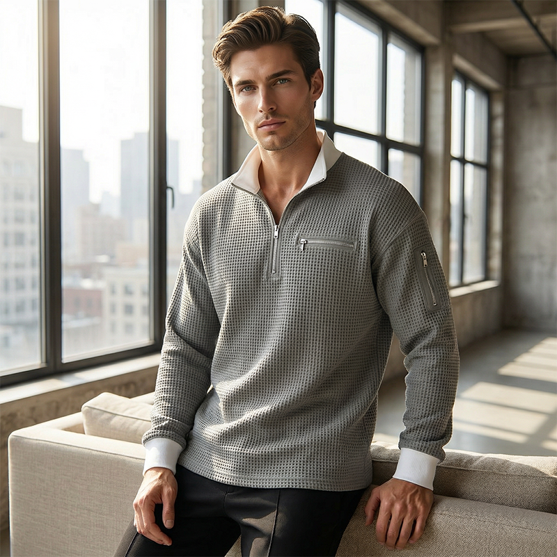 Suéter de punto gofrado para hombre con cremallera hasta el cuello.