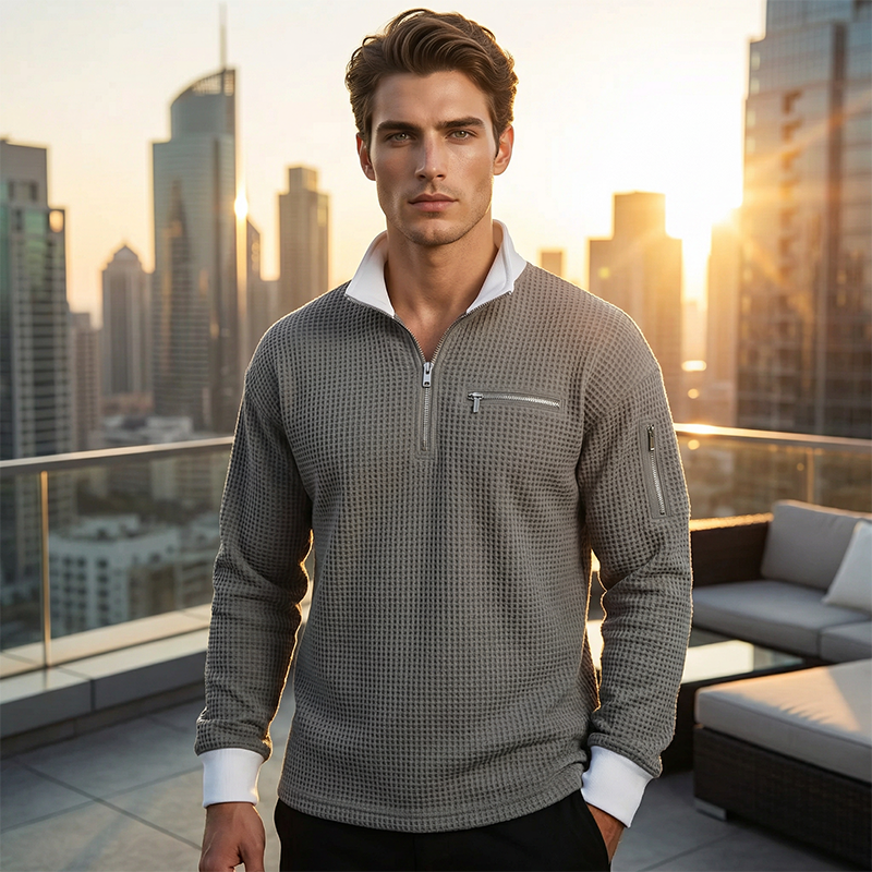 Suéter de punto gofrado para hombre con cremallera hasta el cuello.
