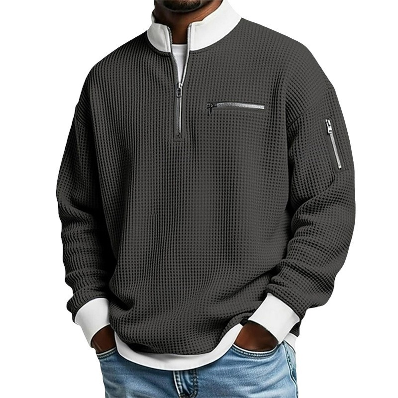 Suéter de punto gofrado para hombre con cremallera hasta el cuello.