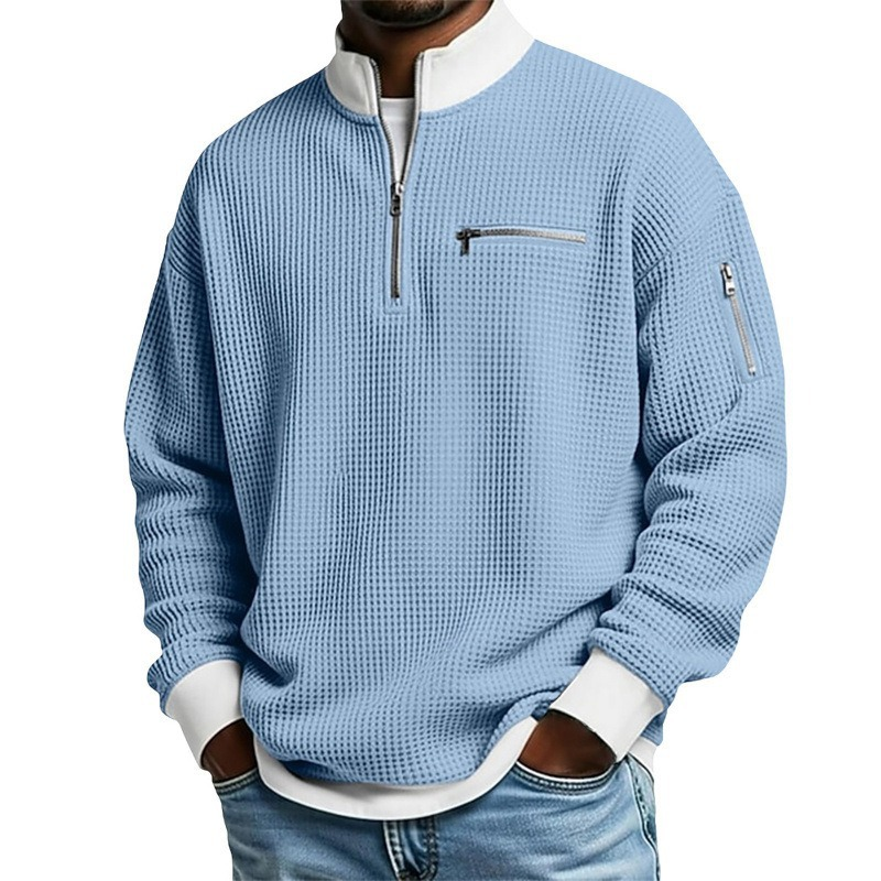 Suéter de punto gofrado para hombre con cremallera hasta el cuello.