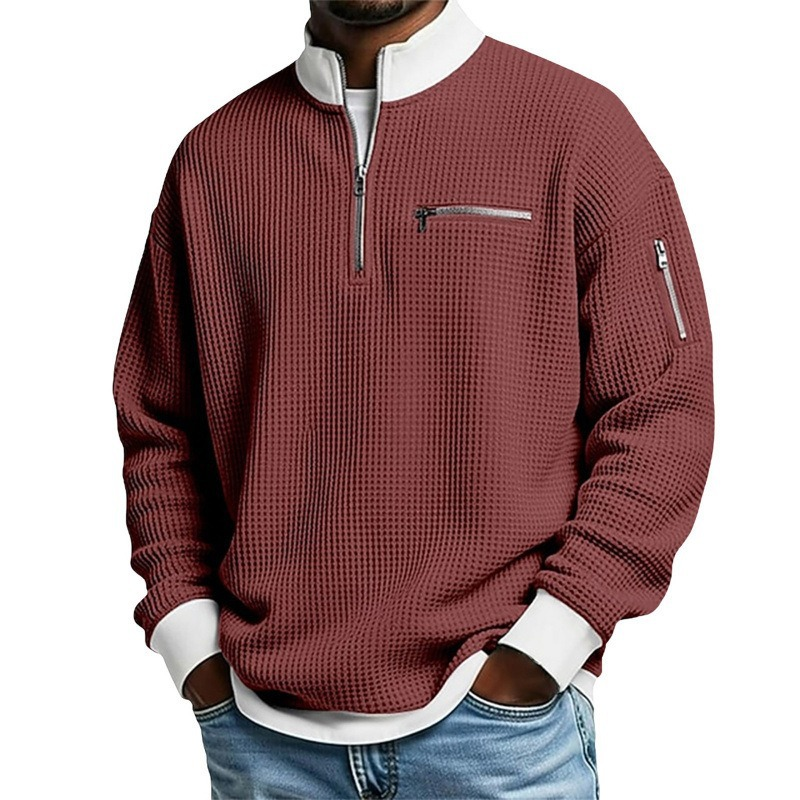 Suéter de punto gofrado para hombre con cremallera hasta el cuello.
