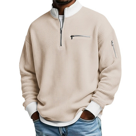 Suéter de punto gofrado para hombre con cremallera hasta el cuello.