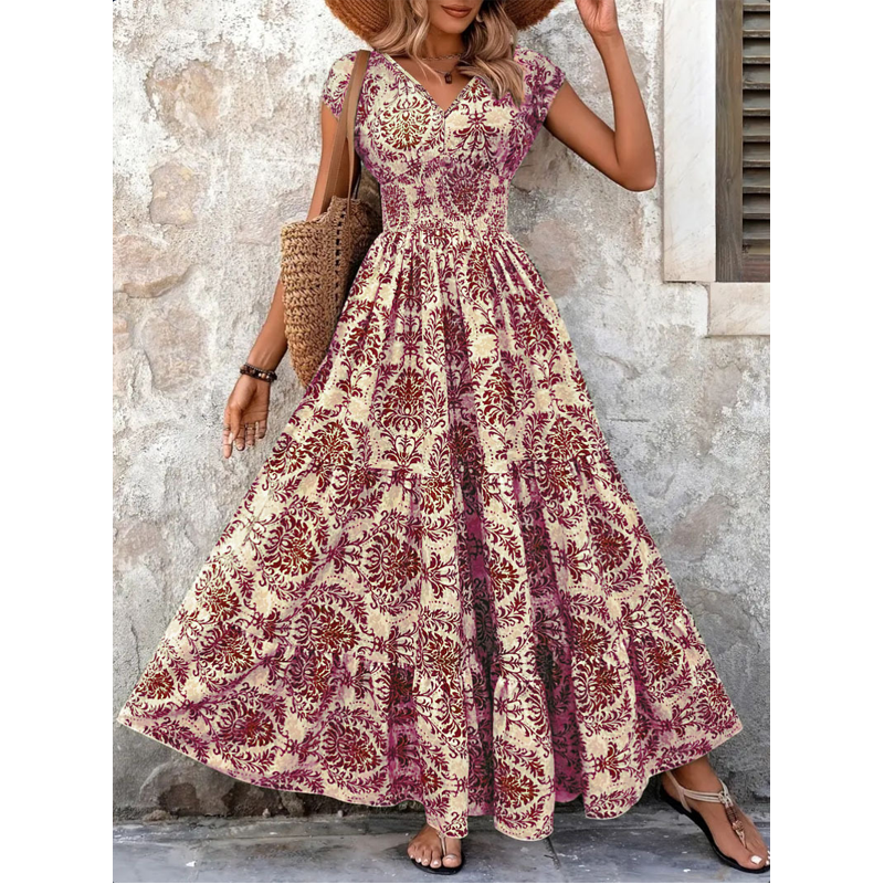 Vestido largo de mujer con escote en V, estampado floral y cintura fruncida.